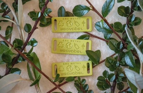 GRS recycled metal tab