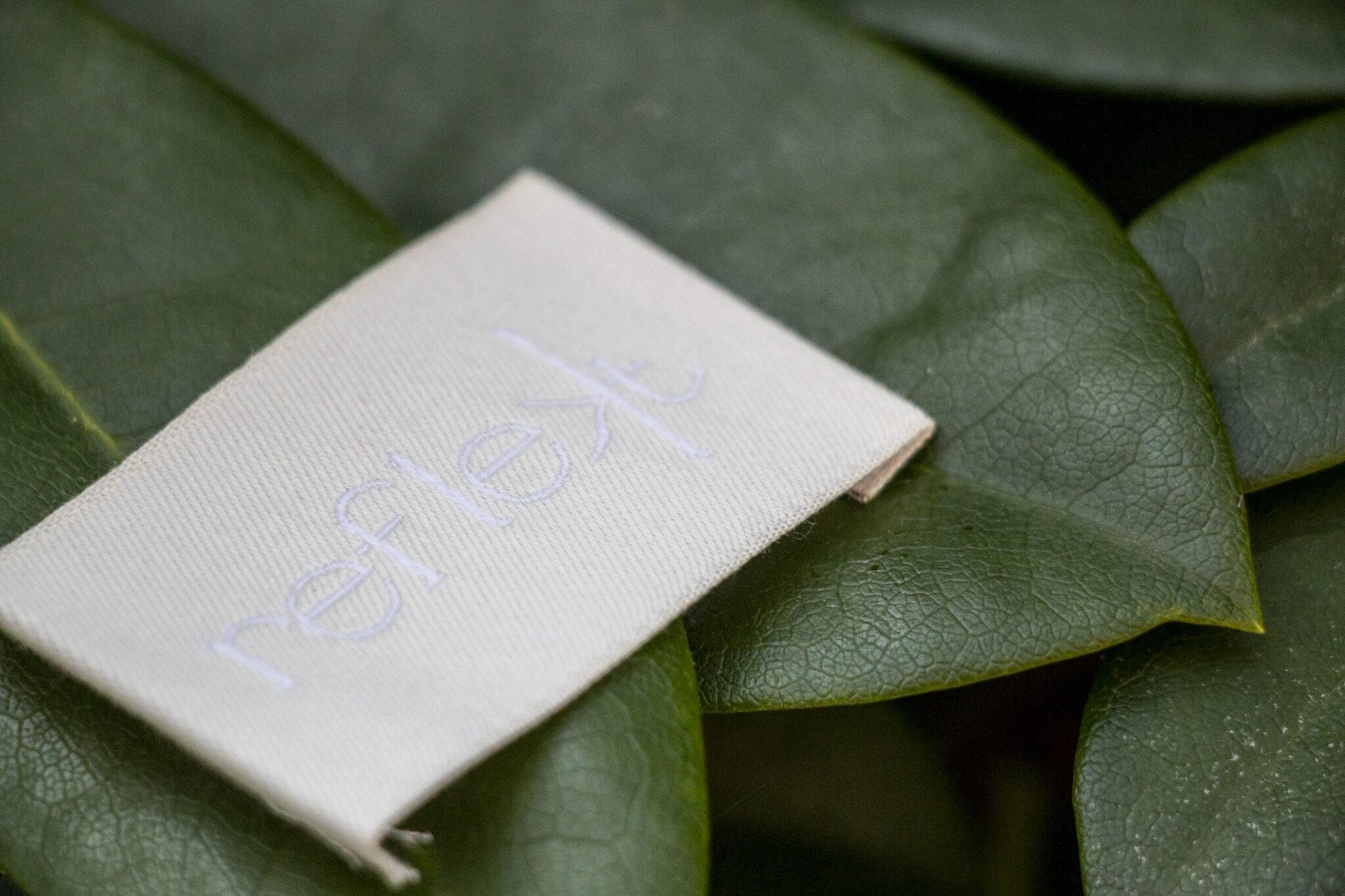 Reflekt woven cotton label