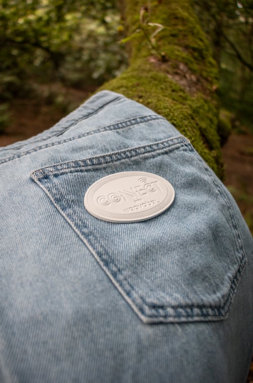 A leather patch with embedded NFC technology. 