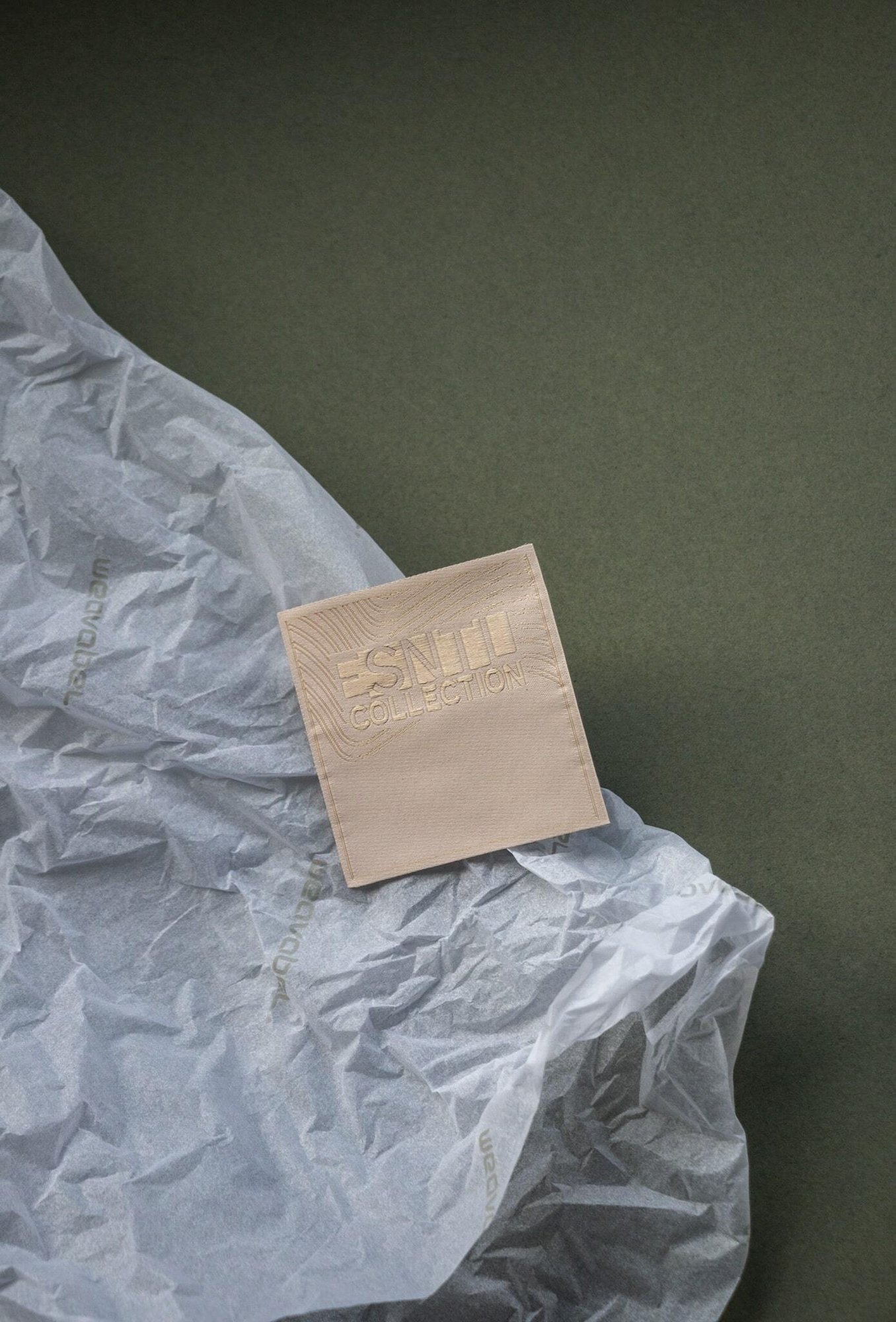 The Essential woven label