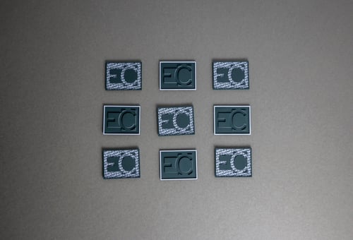 The Essential moulded silicone badge