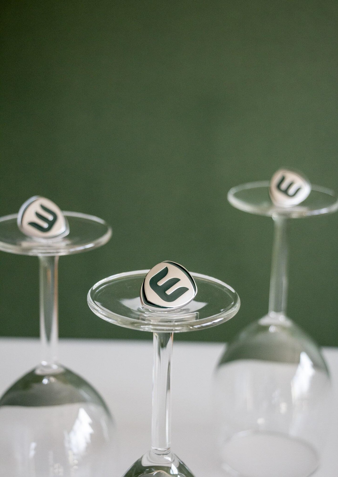 Weavabel green and silver convex pin badge with enamel