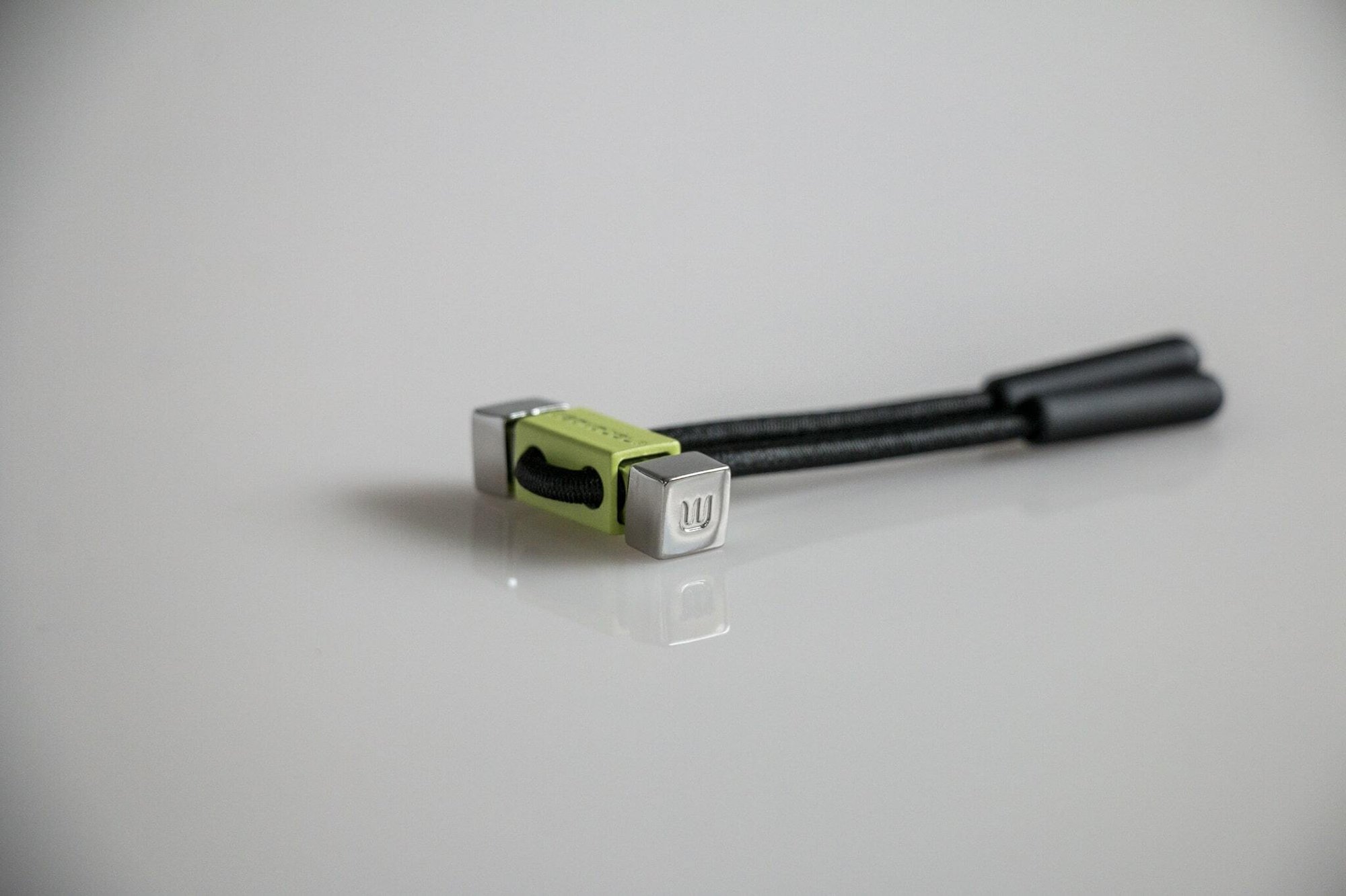 Weavabel branded lime and silver cord toggle