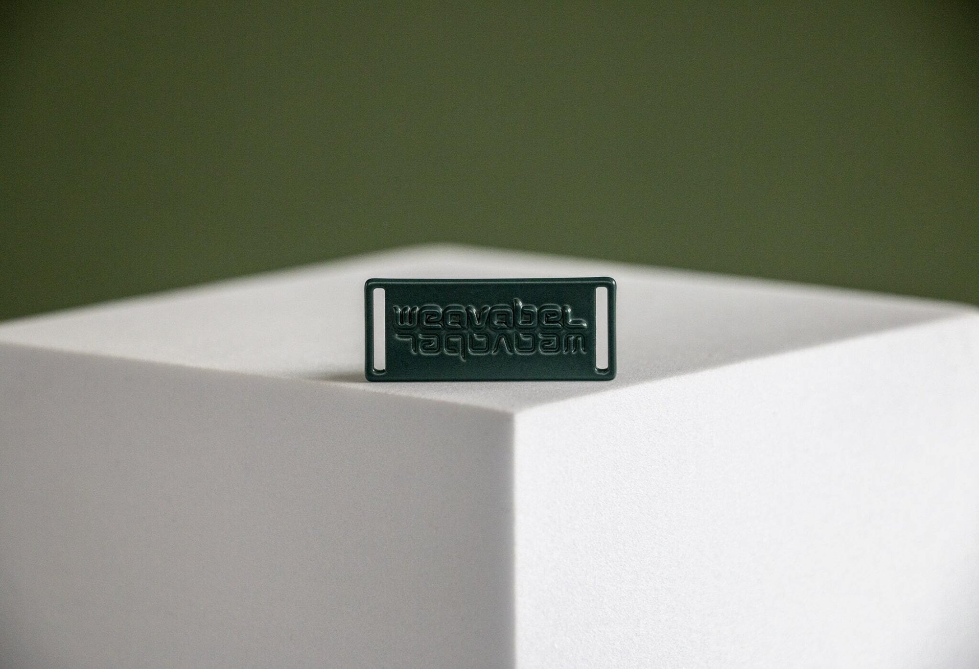 Weavabel moulded green plaque