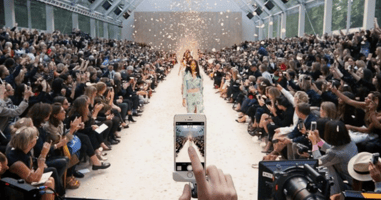 Models walking down a runway