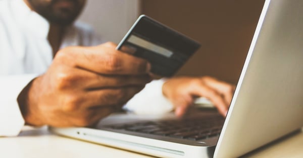 man purchasing online