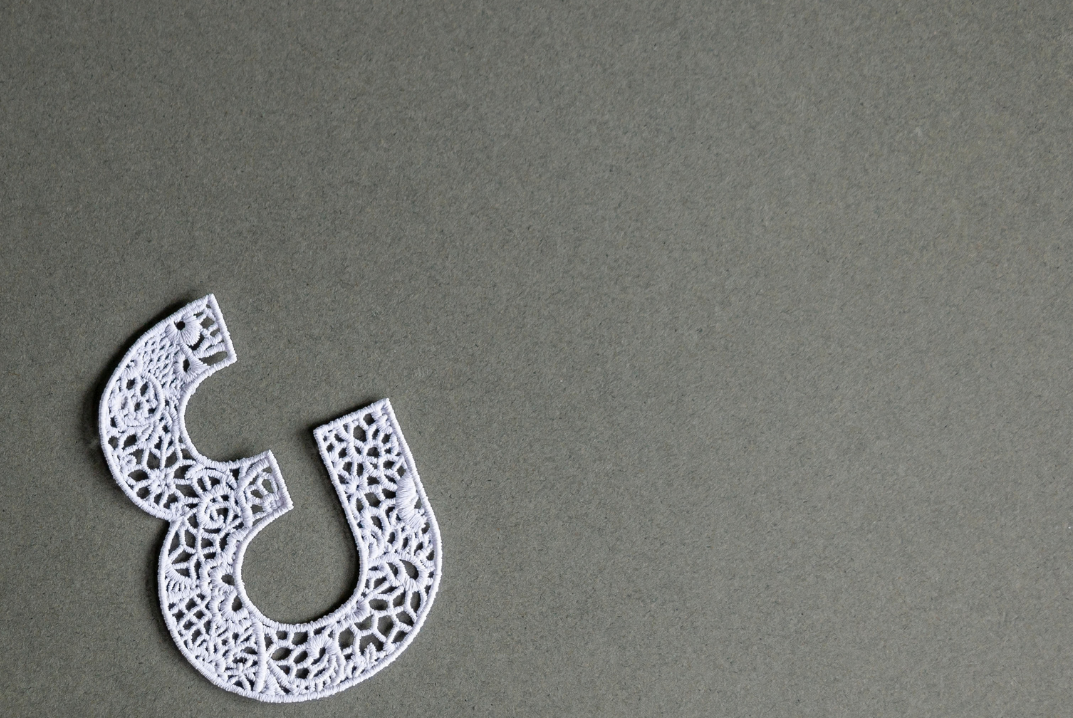 AND Collection lace badge