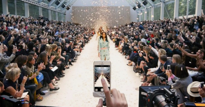 Models walking down a runway
