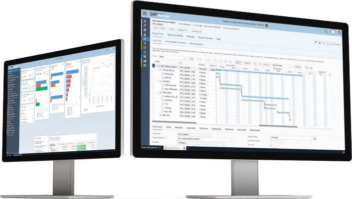 Two computer monitors showing data, bar charts and timelines