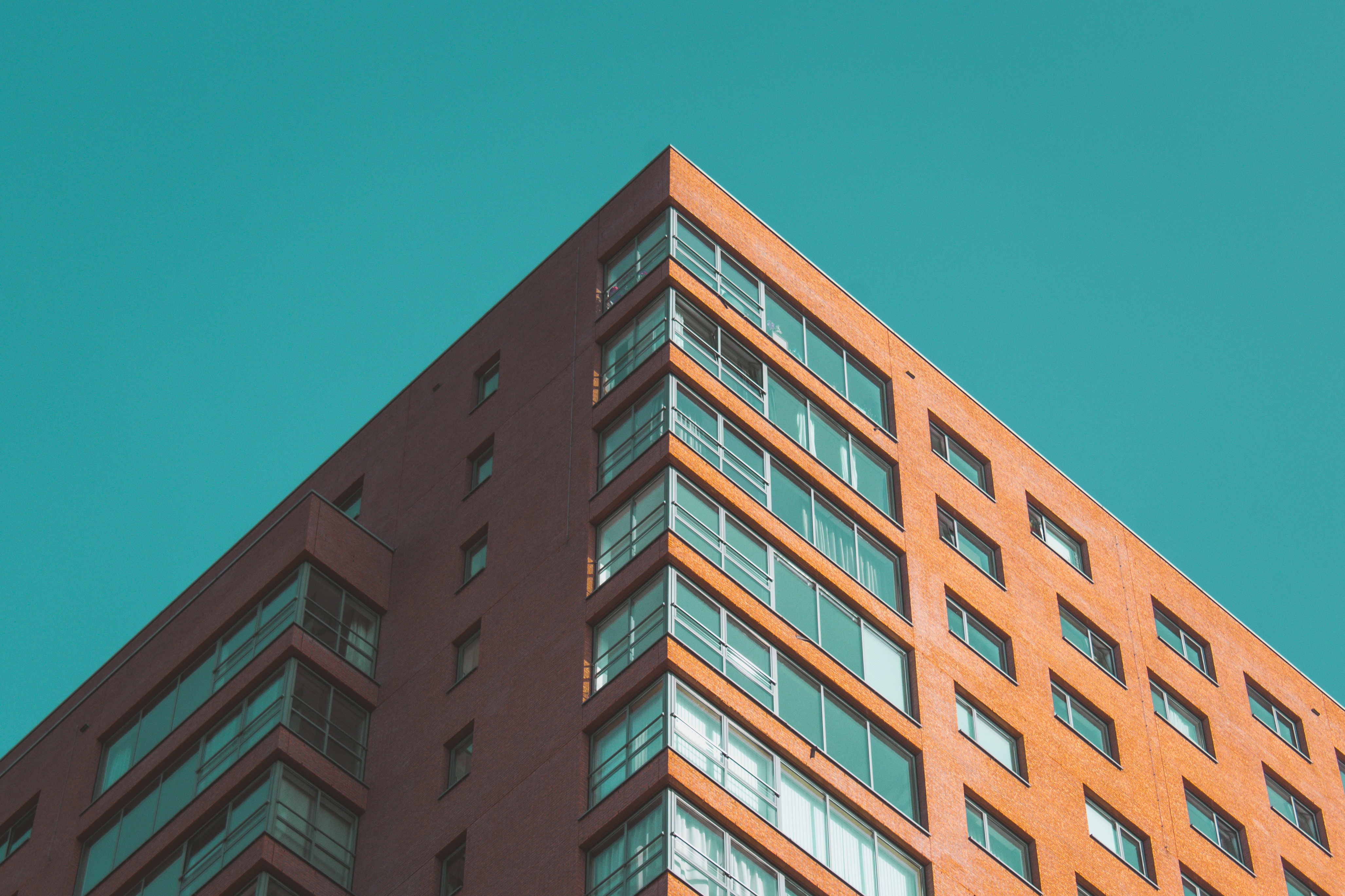 Block of flats/apartments with a clear blue sky